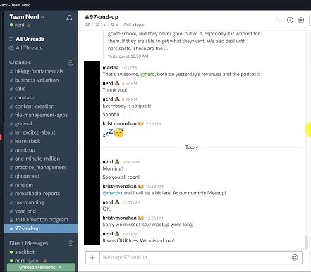 Slack communication on computer between construction marketing team and SEO firm