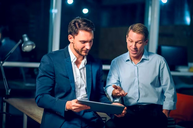 Marketing manager reviewing SEO content strategy on laptop