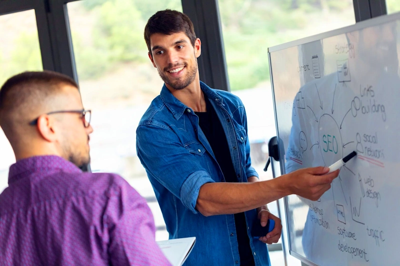 Marketing team strategizing SEO for moving company